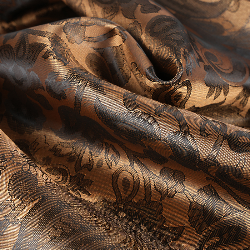 Jacquard fleur de luth festonné en polyester