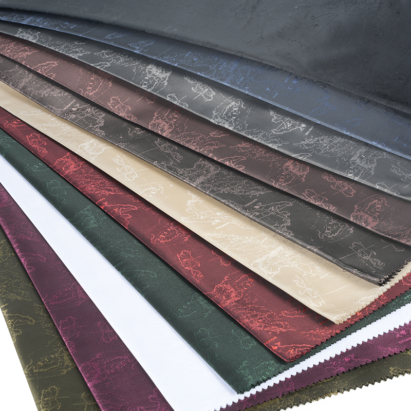 Jacquard de carte de logo anglais cationique en polyester