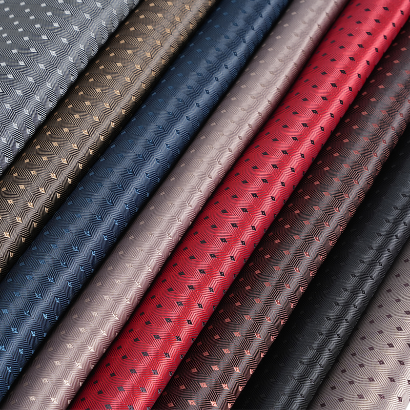 Tissu à grille en petits diamants à fond sergé à chevrons PV