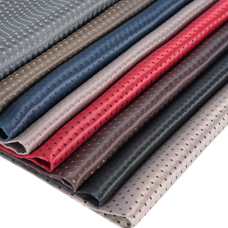 Tissu à grille en petits diamants à fond sergé à chevrons PV